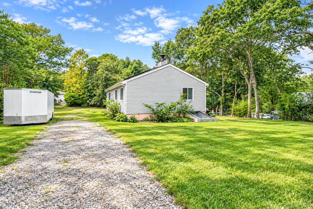 Photo of 95 W Bartlett Road, Middle Island, NY 11953 (MLS # 1056935)