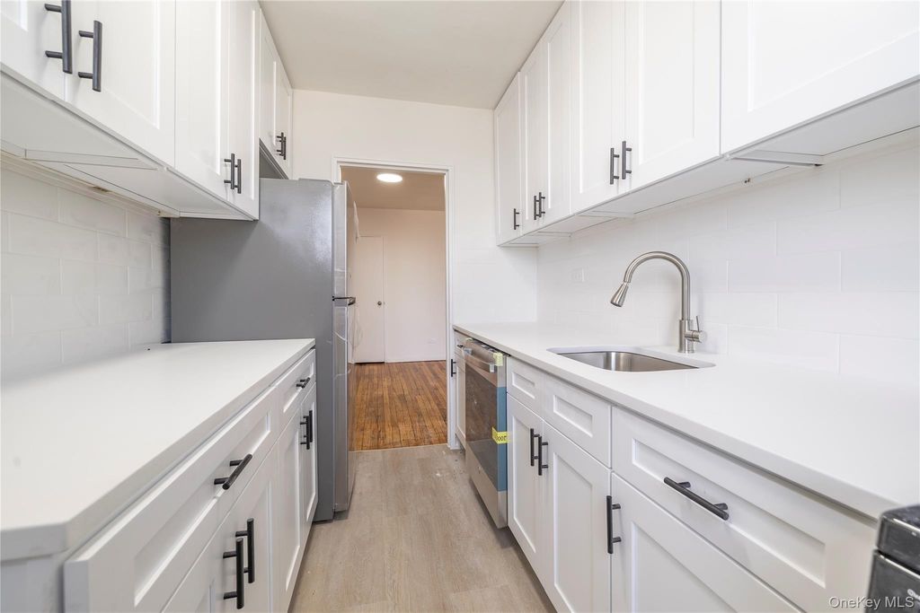 Photo of 1040 Neilson Street #4F, Far Rockaway, NY 11691 (MLS # 1005511)