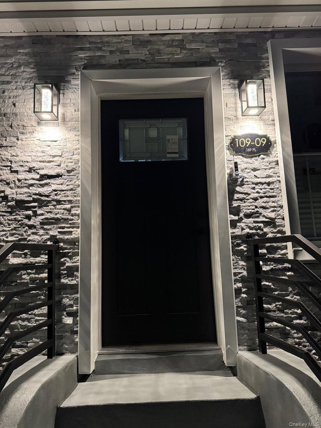 Photo of 10909 169th Place, Jamaica, NY 11433 (MLS # 979791)