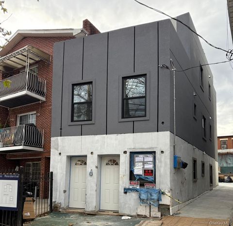 Photo of 33-34 109 Street, Corona, NY 11368 (MLS # 936437)