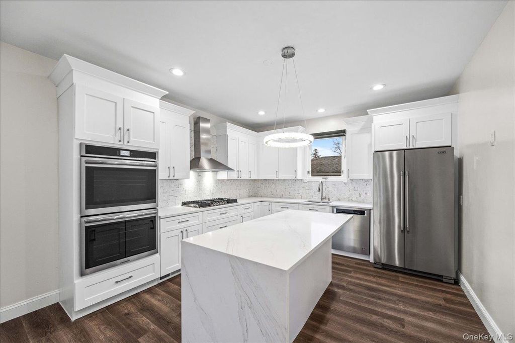 Photo of 18 Wellington Road, Greenvale, NY 11548 (MLS # 979915)