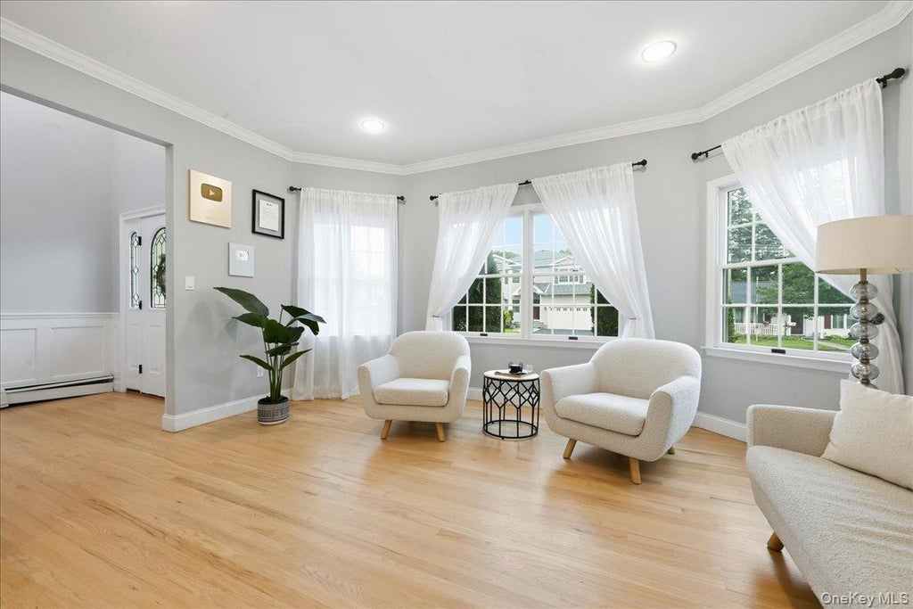 Photo of 151 Monroe Street, Massapequa Park, NY 11762 (MLS # 1056938)