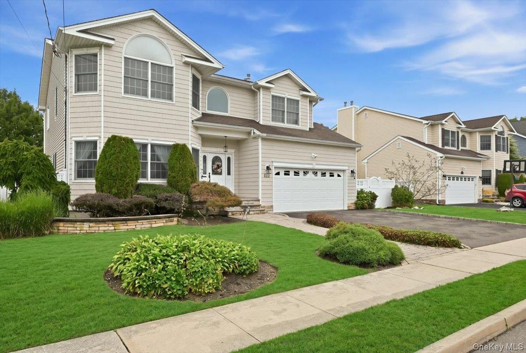Photo of 151 Monroe Street, Massapequa Park, NY 11762 (MLS # 1056938)