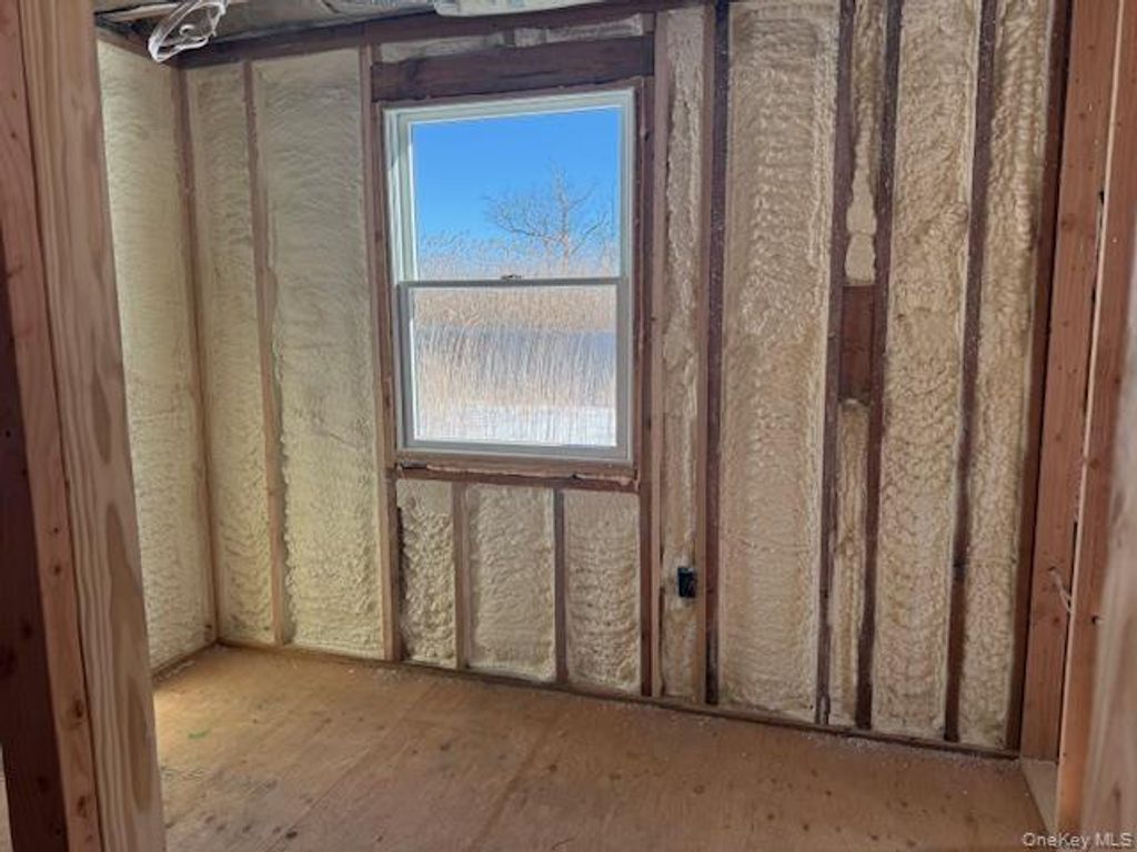 Photo of 17 Bayport Road, Mastic Beach, NY 11951 (MLS # 960432)