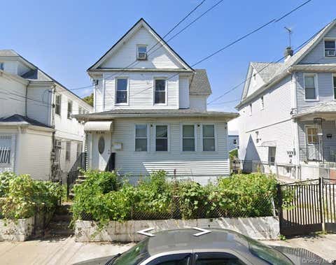 Photo of 8762 133rd Street, Richmond Hill, NY 11418 (MLS # 1028986)