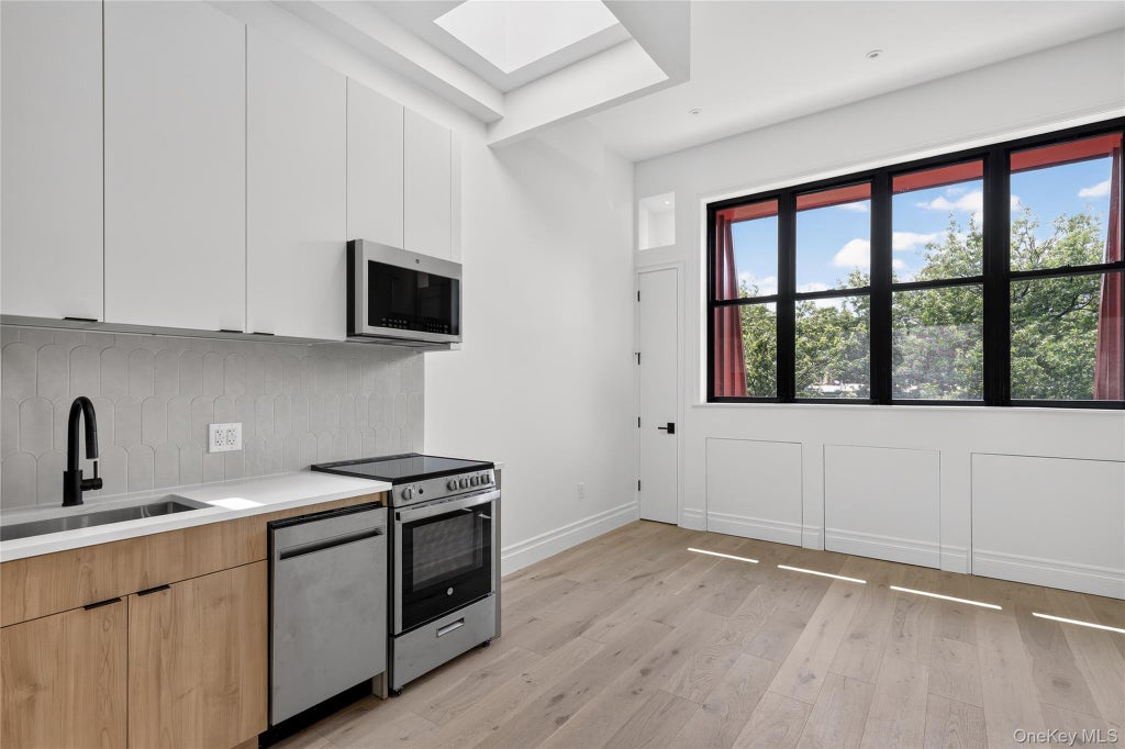 Photo of 427 E 140th Street #8, Bronx, NY 10451 (MLS # 1048732)