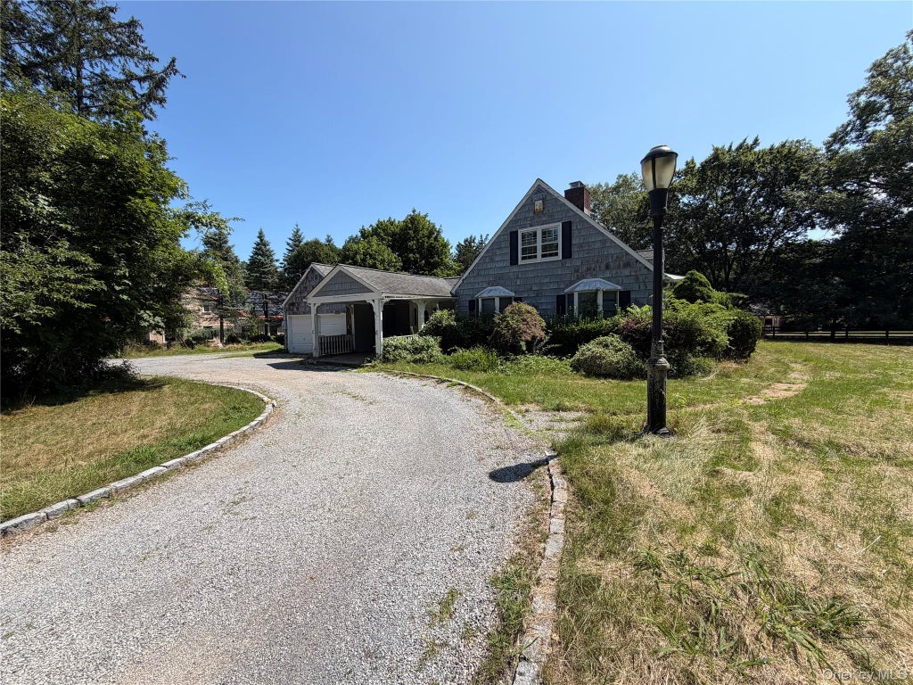 Photo of 2212 Route 106, Syosset, NY 11791 (MLS # 1032974)