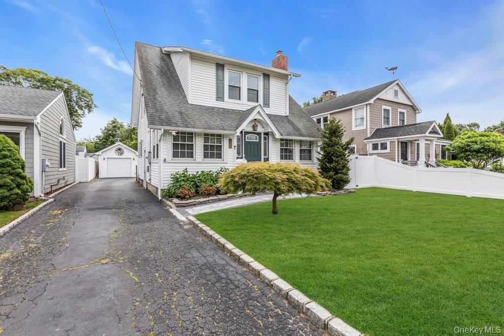 Photo of 77 Rollstone Avenue, West Sayville, NY 11796 (MLS # 968064)