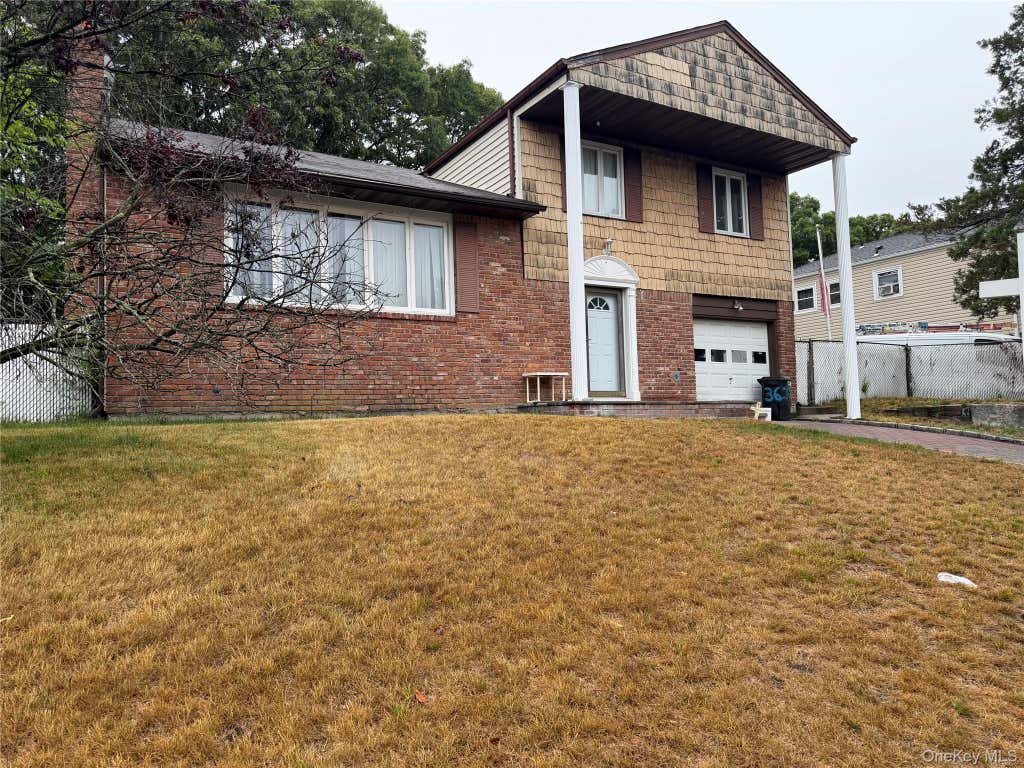 Photo of 36 Willow Street, Selden, NY 11784 (MLS # 1017396)
