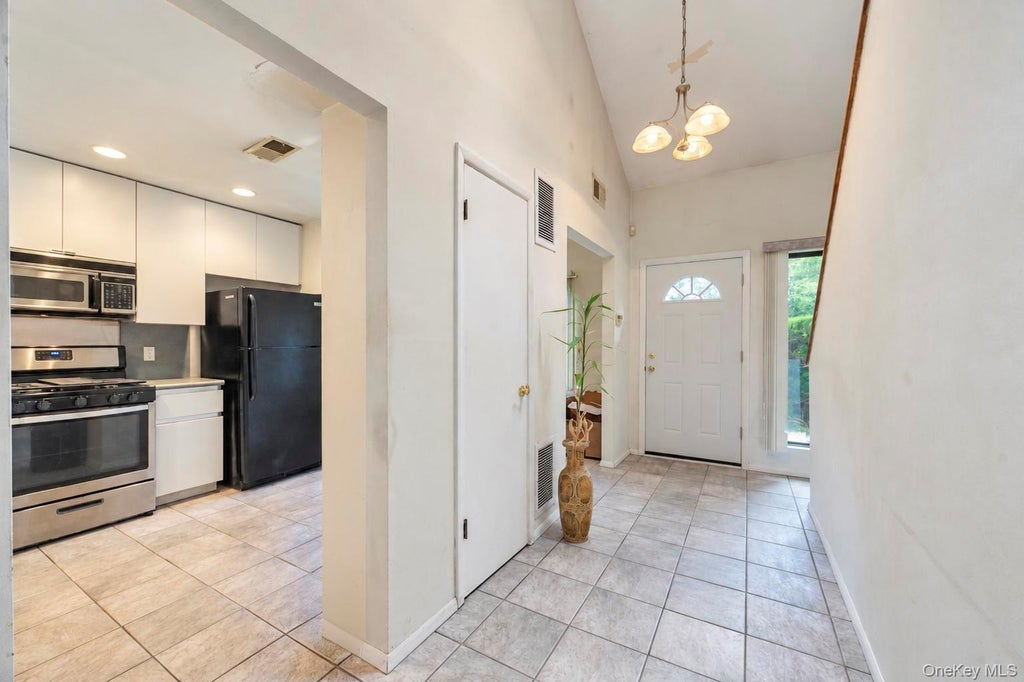 Photo of 12 Hidden Pines Way, Bohemia, NY 11716 (MLS # 1047157)