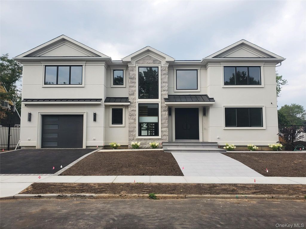 Photo of 65 Page Lane, Westbury, NY 11590 (MLS # 888764)
