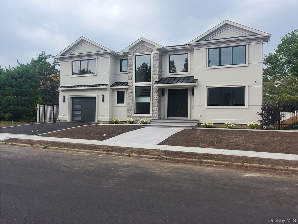Photo of 65 Page Lane, Westbury, NY 11590 (MLS # 888764)