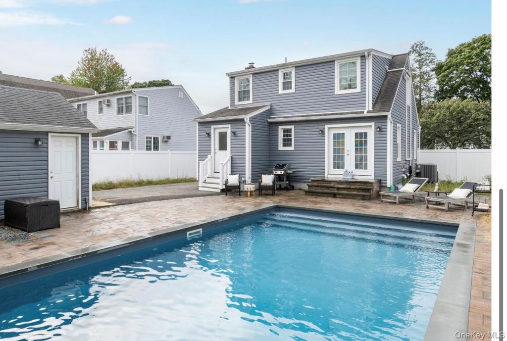 Photo of 132 Webster Street St, Merrick, NY 11566 (MLS # 968395)