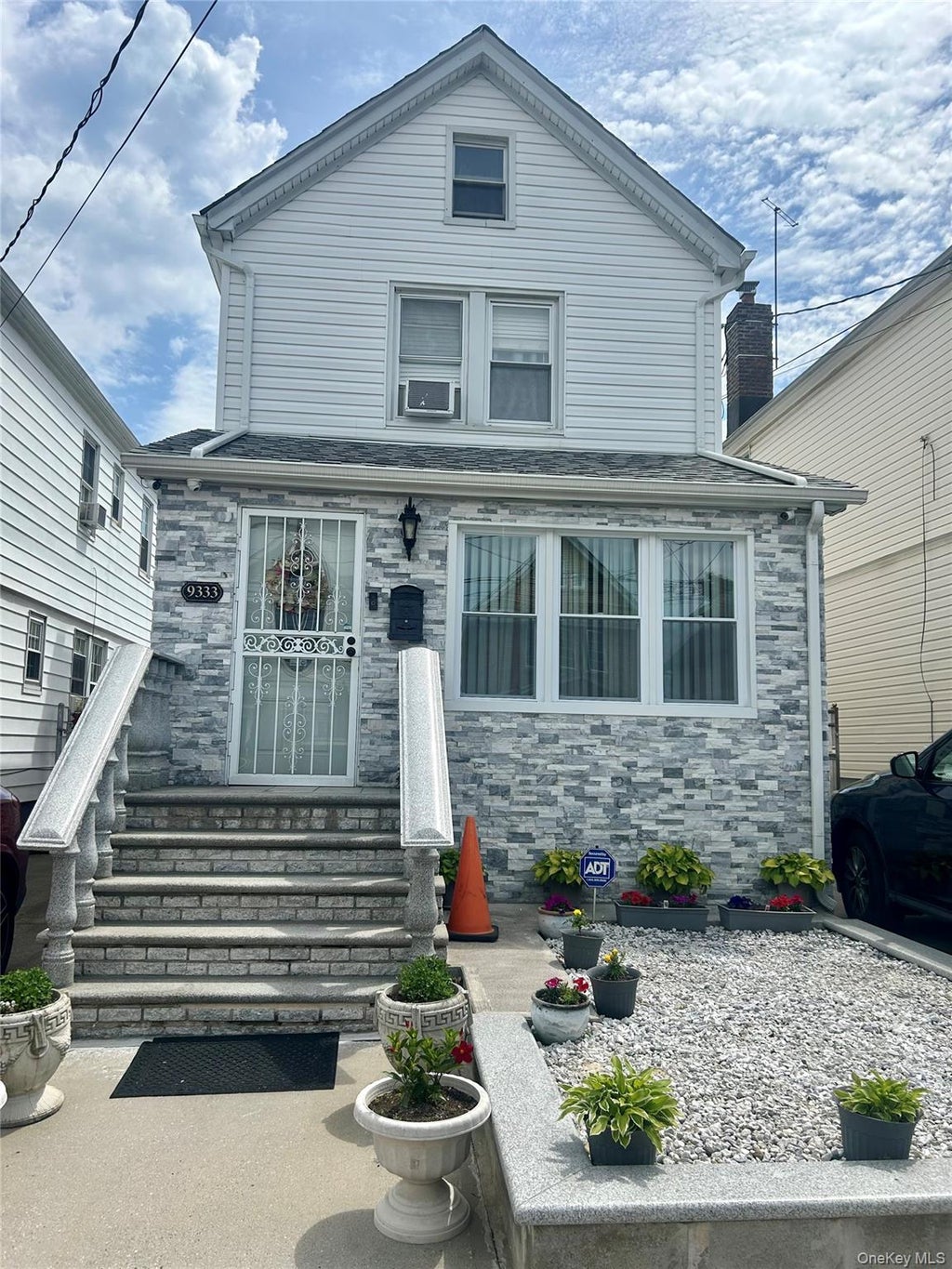 Photo of 9333 212th Place, Queens Village, NY 11428 (MLS # 1010154)