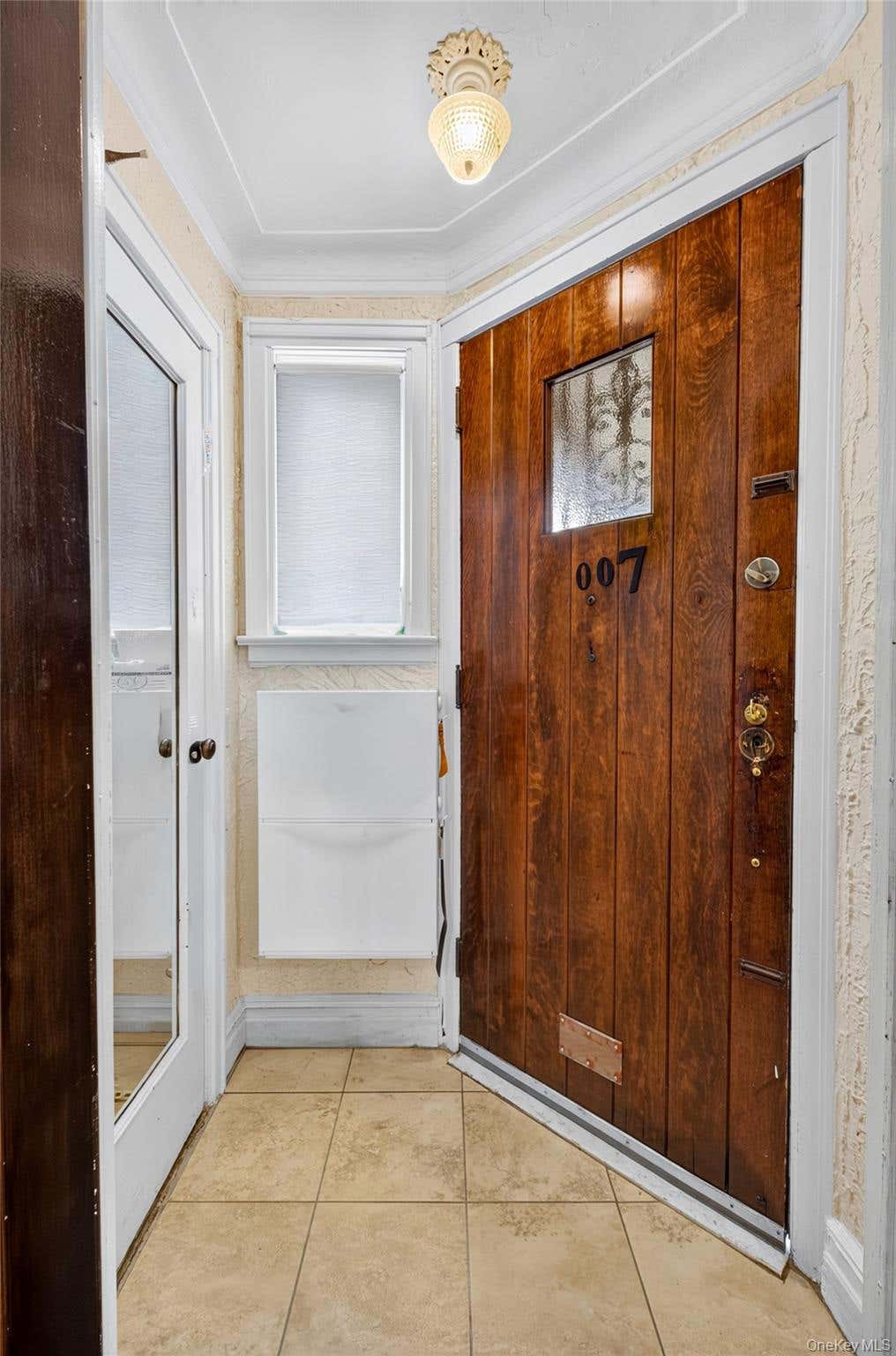 Photo of 4215 172nd Street, Flushing, NY 11358 (MLS # 1033568)