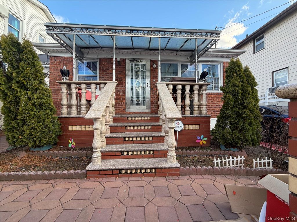 Photo of 174-28 126th Avenue, Jamaica, NY 11434 (MLS # 973134)