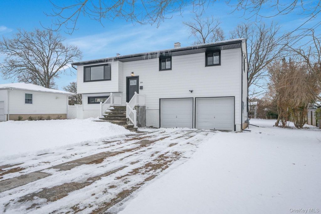 Photo of 104 Harrisburg Street, Bay Shore, NY 11706 (MLS # 943663)