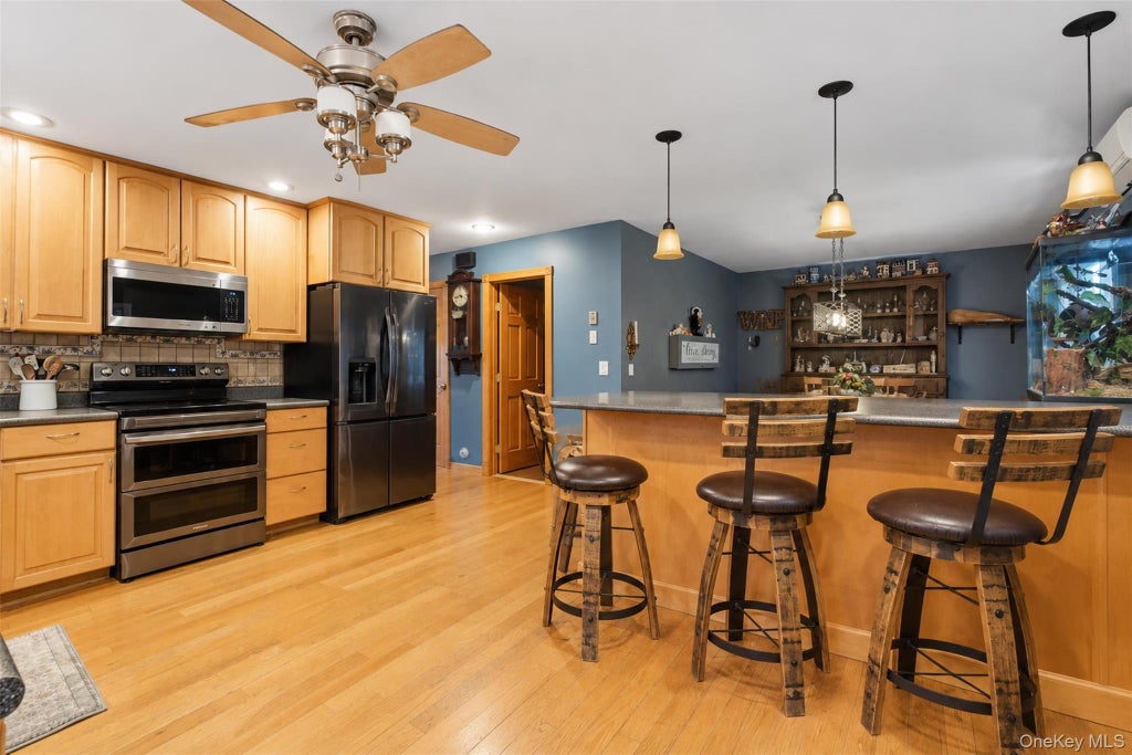 Photo of 55 Tanglewylde Road, Lake Peekskill, NY 10537 (MLS # 1061534)
