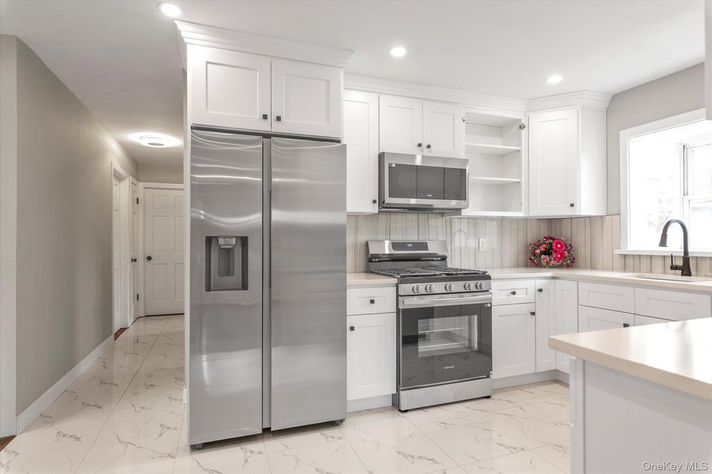 Photo of 57 E Clinton Avenue, Roosevelt, NY 11575 (MLS # 966949)