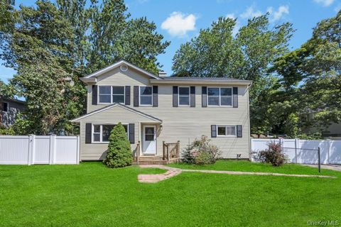 Photo of 107 Shinnecock Avenue, Mastic, NY 11950 (MLS # 929524)