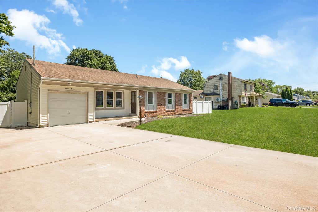 Photo of 93 Raynor Road, Ridge, NY 11961 (MLS # 1031187)