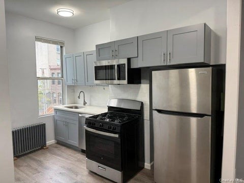 Photo of 857 Woodward Avenue Ave #2R, Ridgewood, NY 11385 (MLS # 1046782)