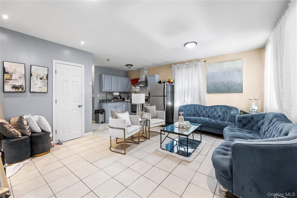 Photo of 1031 E 216th Street, Bronx, NY 10469 (MLS # 958823)