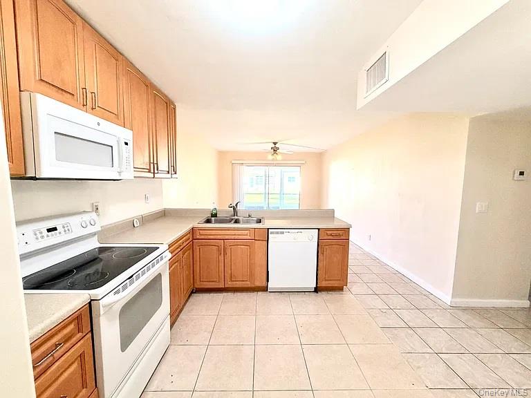 Photo of 3500 SW Natura Boulevard #107, Out of Area, FL 33441 (MLS # 1066778)