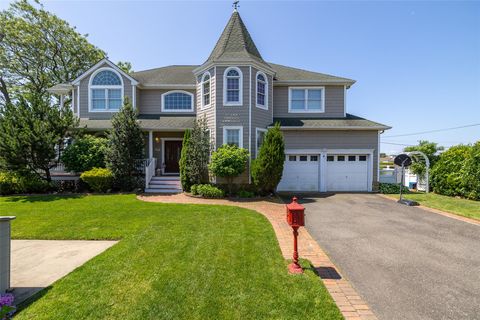 Photo of 248 Delaware Avenue, Island Park, NY 11558 (MLS # 877979)