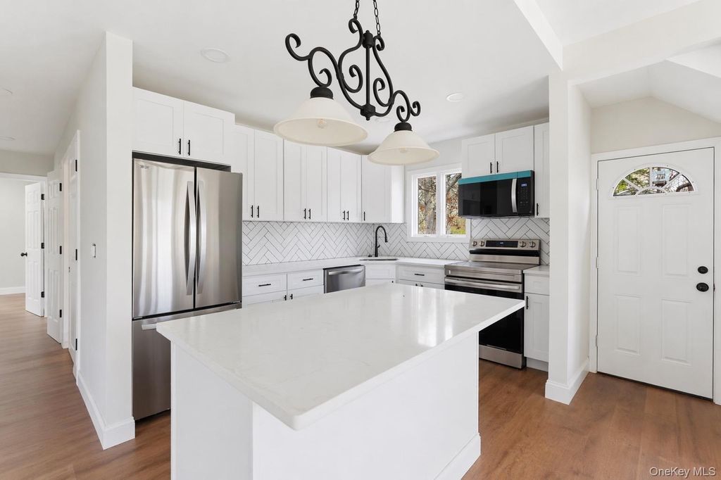 Photo of 156 church dr DR, Mastic Beach, NY 11951 (MLS # 998276)