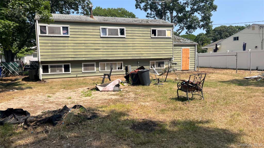 Photo of 47 Hunter Lane, Centereach, NY 11720 (MLS # 1033499)