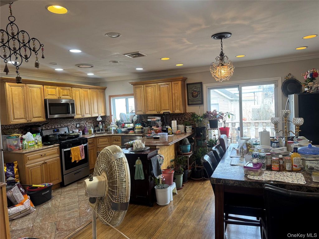 Photo of 93-43 215th Place, Queens Village, NY 11428 (MLS # 944539)