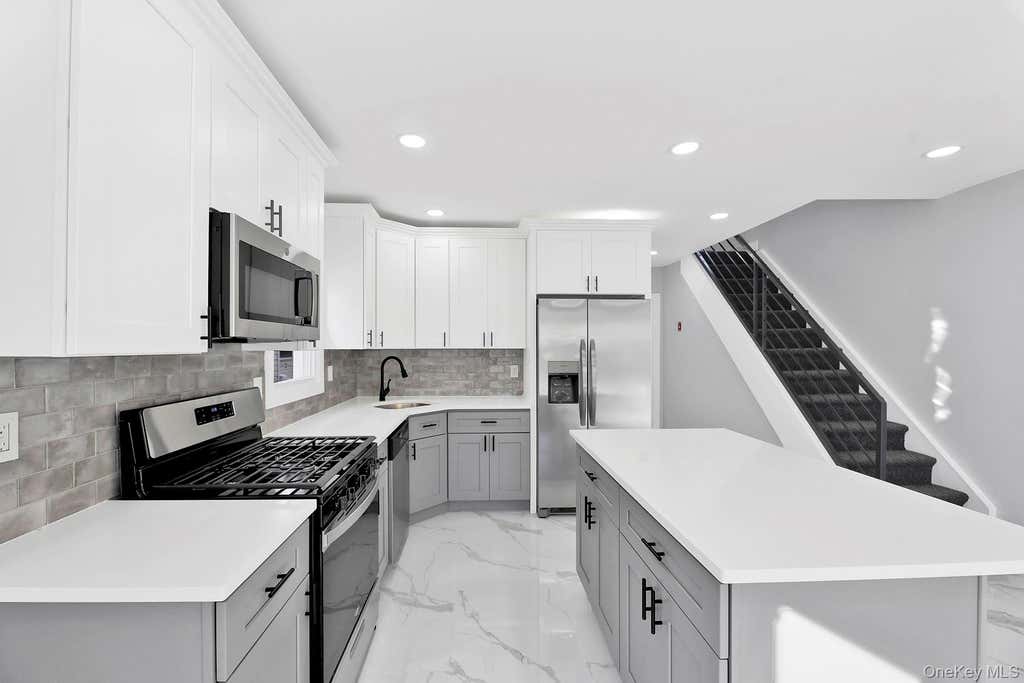 Photo of 10920 221st Street, Queens Village, NY 11429 (MLS # 1024350)