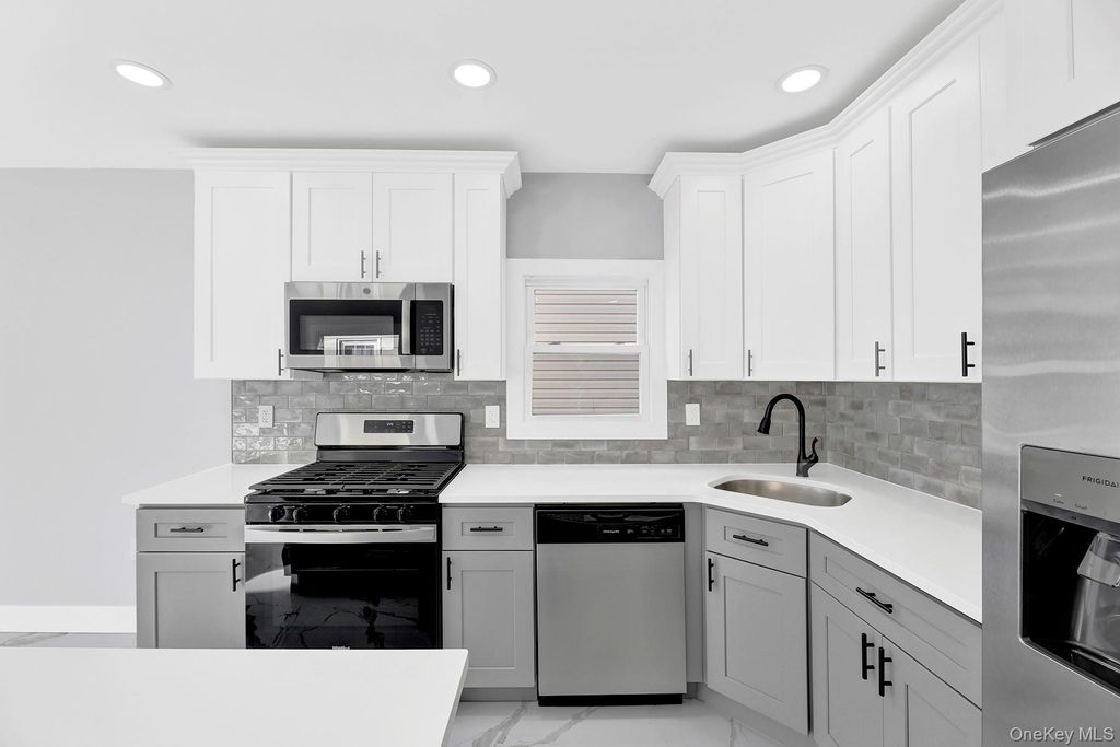 Photo of 10920 221st Street, Queens Village, NY 11429 (MLS # 1024350)
