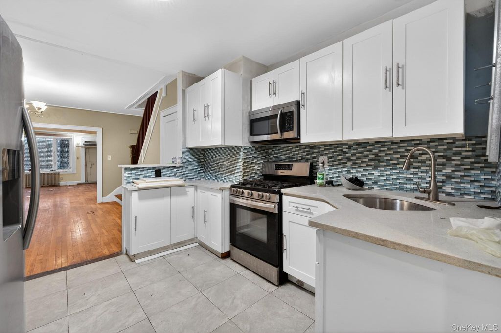 Photo of 10743 128th Street, Richmond Hill, NY 11419 (MLS # 965478)