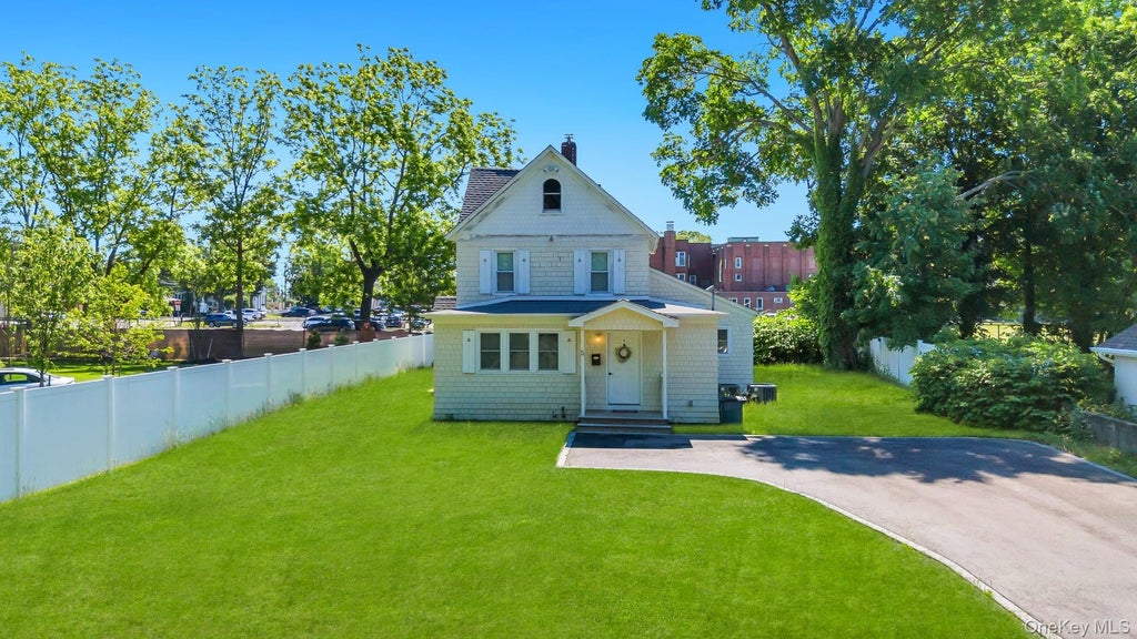 Photo of 5 Hawkins Avenue, Smithtown, NY 11787 (MLS # 1008241)