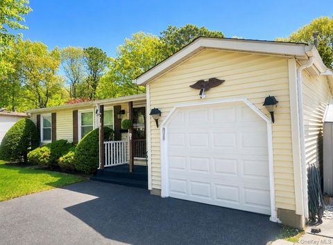 Photo of 19 Village Circle S, Manorville, NY 11949 (MLS # 998604)
