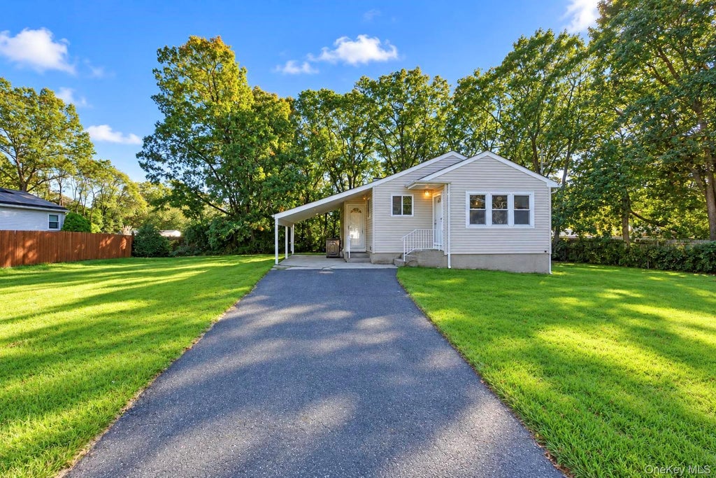 Photo of 384 Locust Street, Central Islip, NY 11722 (MLS # 1067058)