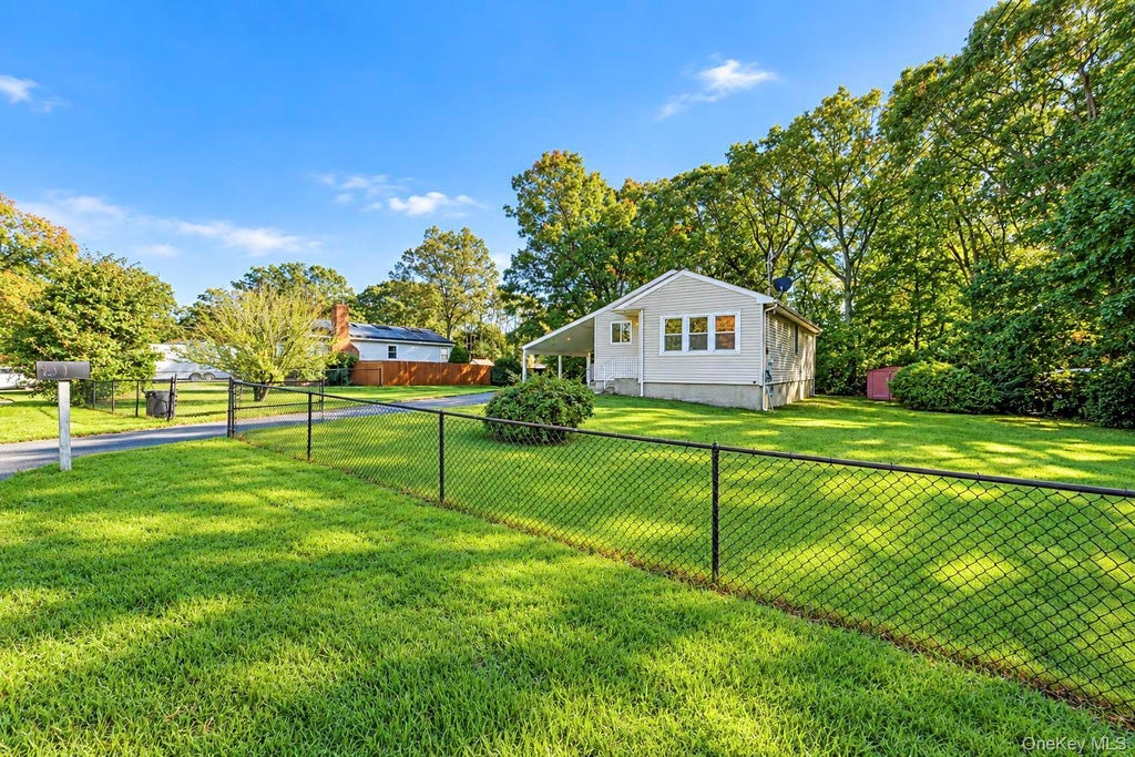 Photo of 384 Locust Street, Central Islip, NY 11722 (MLS # 1067058)