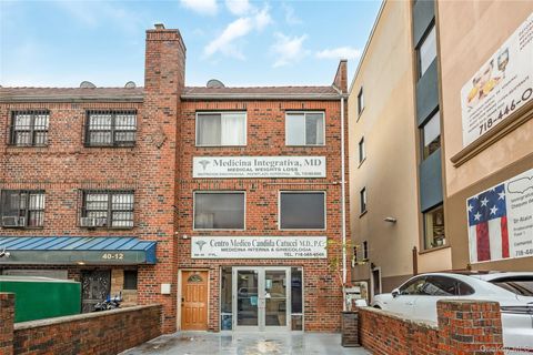 Photo of 40-10 Forley Street, Elmhurst, NY 11373 (MLS # 938082)