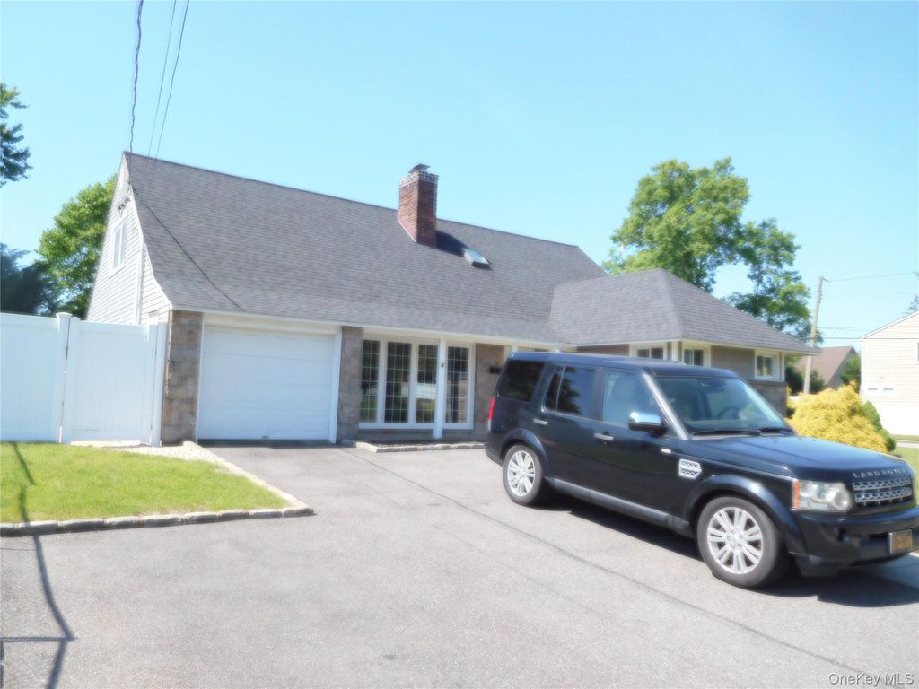 Photo of 9 Adams Street, East Rockaway, NY 11518 (MLS # 964312)