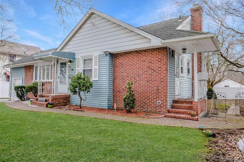 Photo of 241 Woodbury Road, Hicksville, NY 11801 (MLS # 948861)