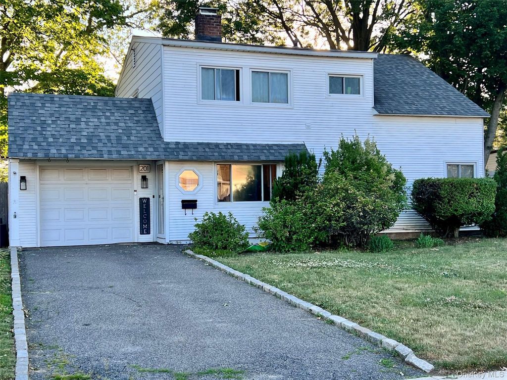 Photo of 201 Cypress Lane W, Westbury, NY 11590 (MLS # 1016335)