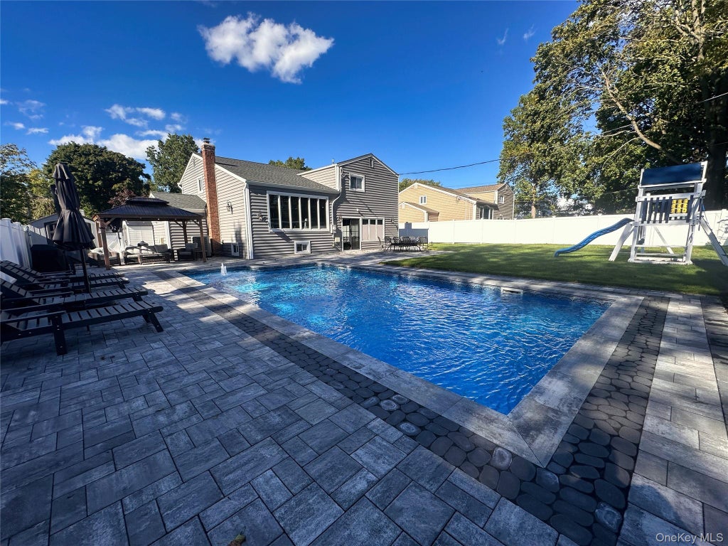 Photo of 29 Voorhis Drive, Old Bethpage, NY 11804 (MLS # 1058927)