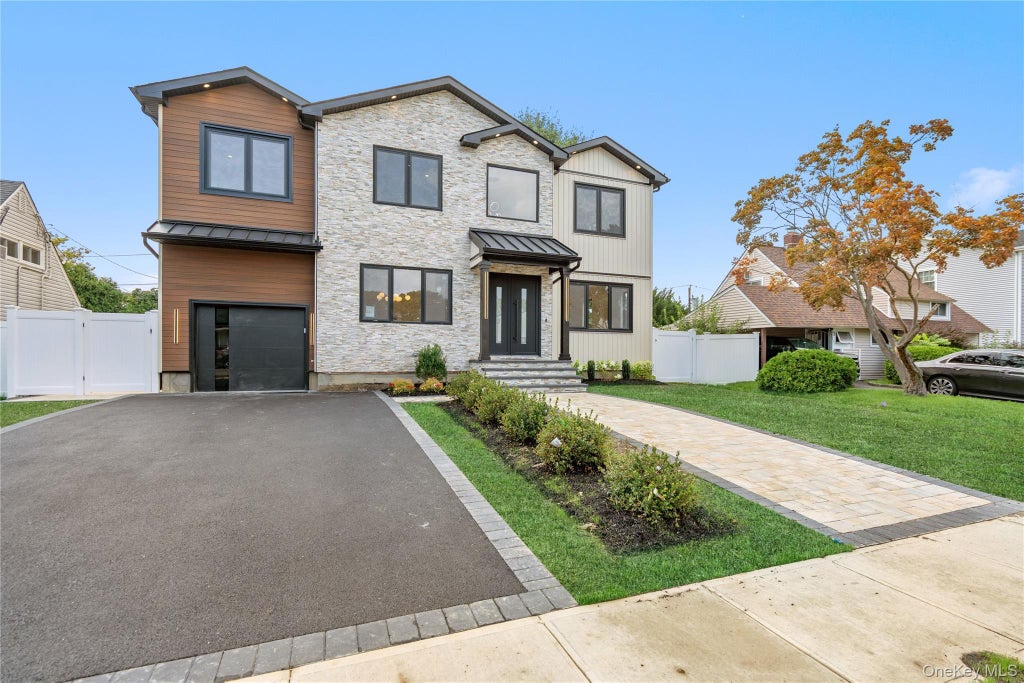 Photo of 30 Hedge Lane, Westbury, NY 11590 (MLS # 1045960)
