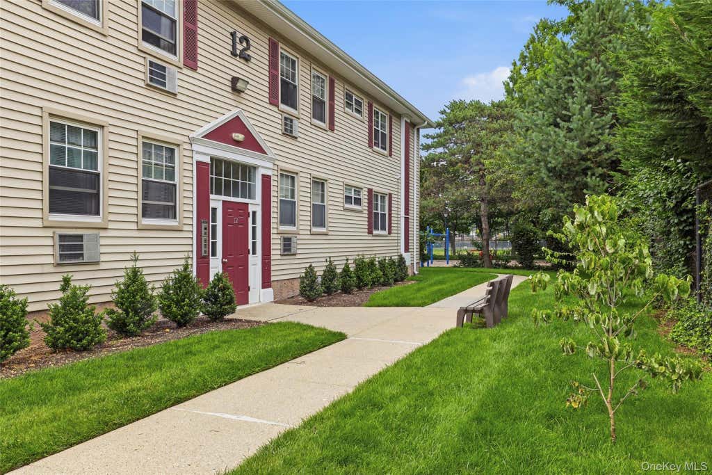 Photo of 324 Post Road #12L, Westbury, NY 11590 (MLS # 1020481)