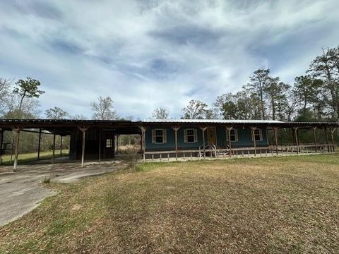 Photo of 2340 Woodland Ridge Dr, Little Cypress, TX 77632 (MLS # 264224)