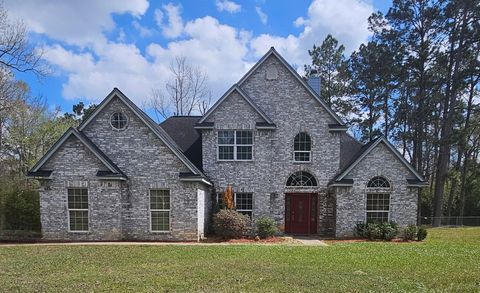 Photo of 1055 Woodrow St, Silsbee, TX 77656 (MLS # 265579)