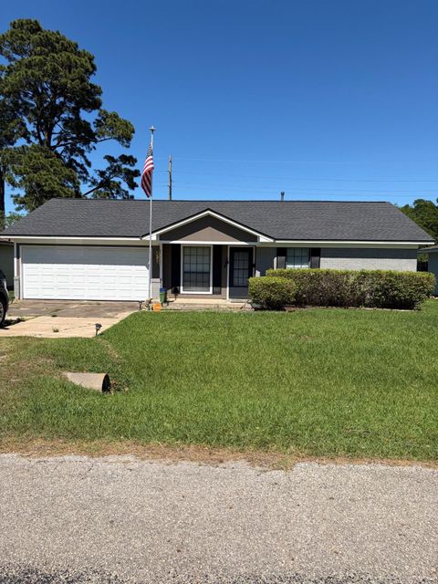 Photo of 219 1st, Nederland, TX 77627 (MLS # 266461)