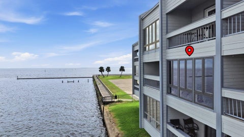 Photo of 560 PLEASURE ISLAND BLVD #219, Port Arthur, TX 77640 (MLS # 271471)